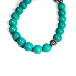 TURQUOISE BEAD BRACELET 8MM (4 SILVER BEADS)